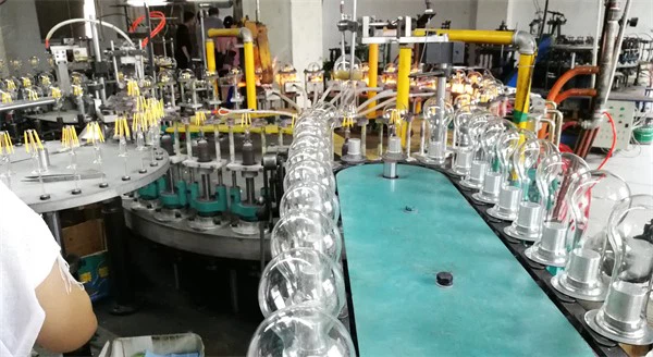 Assembly of LED filament bulbs Assembly of LED filament bulbs